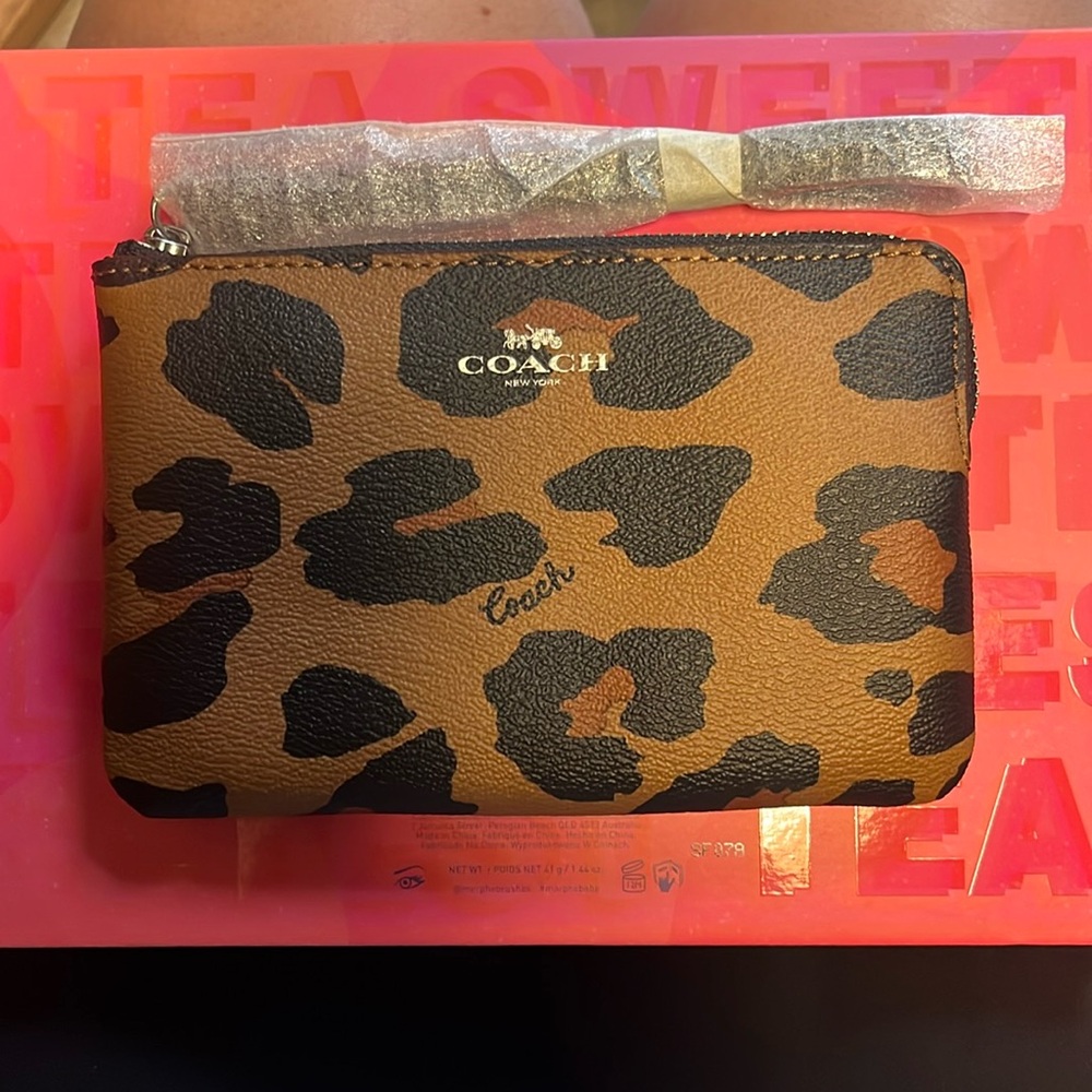 Coach leopard wristlet new never used